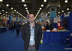 Luis Orrantia with Tropical Specialists walks the floor.